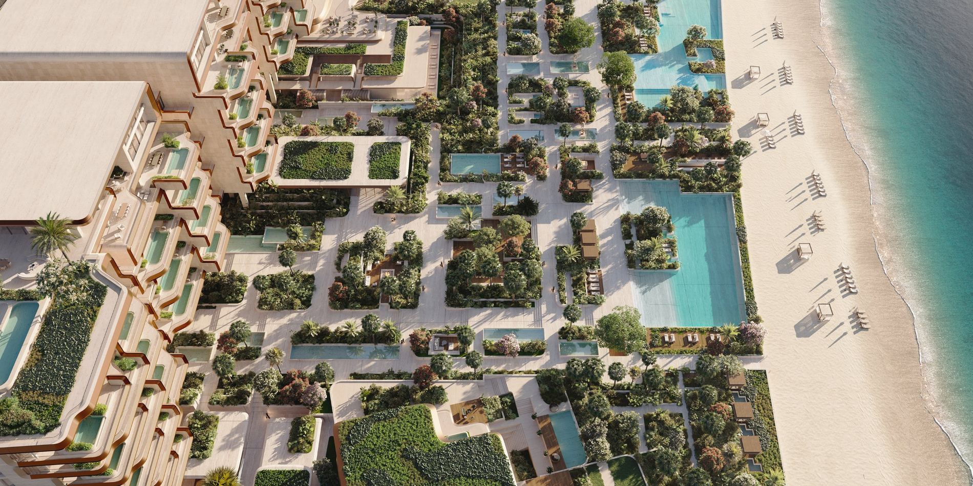 Gardens, pools and the beach seen from above at Alba